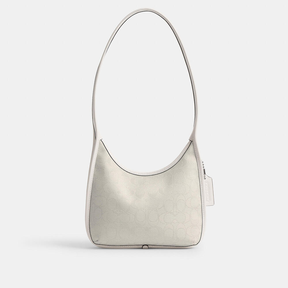 Coach Outlet Curve Zip Bag In Signature Jacquard